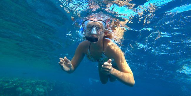 Girl And Snorkeling