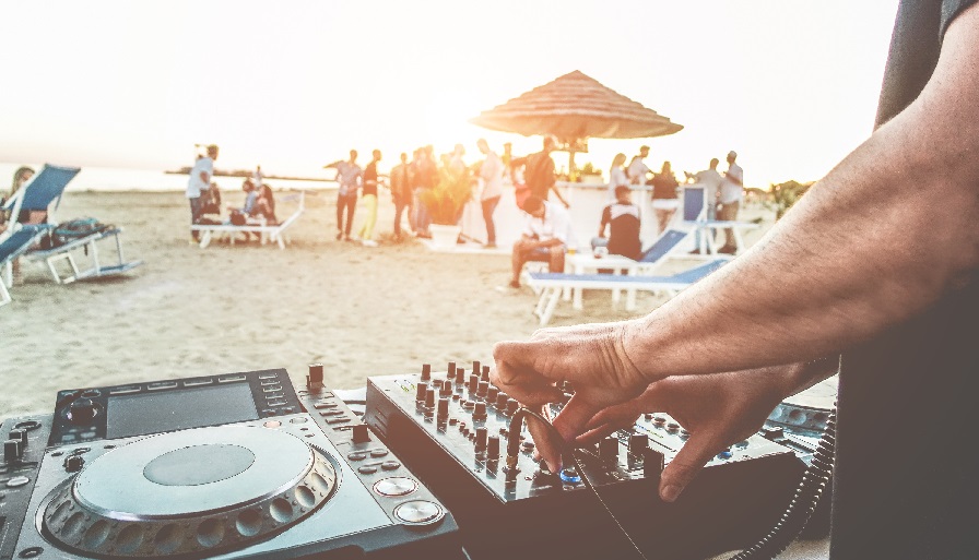 Dj Mixing At Sunset Beach Party In Summer Vacation Outdoor Dis