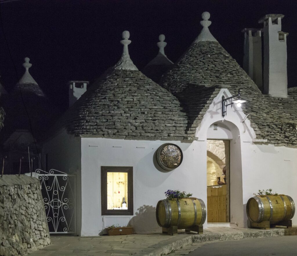 Alberobello, Italy August 27 2017: Night View Of A Traditional Restaurant In The Town Of Alberobello